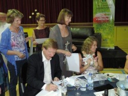 Kerry O’Brien and Jacqueline Freney signing autographs